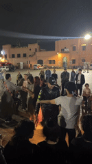 Street performers draw crowds in Marrakesh plaza