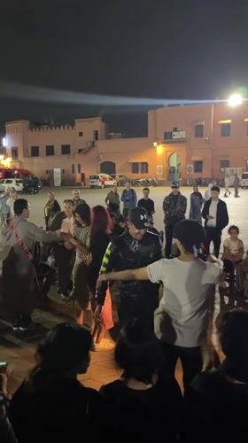 Street performers draw crowds in Marrakesh plaza