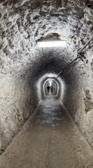 Inside a Romanian salt mine's tunnels and wooden machinery
