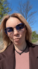 Woman records selfie video outside Vsevolozhsk apartment building