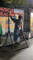 Man exercises outdoors at night in Gijón, Spain
