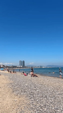 Sunny afternoon beach scenes captured in Barcelona