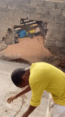 Children play and pose for photos in Jos, Nigeria
