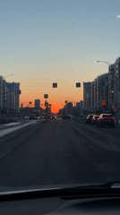 Dashcam captures sunset street view in Nizhnevartovsk, Russia