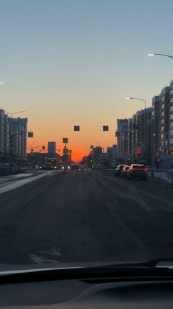 Dashcam captures sunset street view in Nizhnevartovsk, Russia