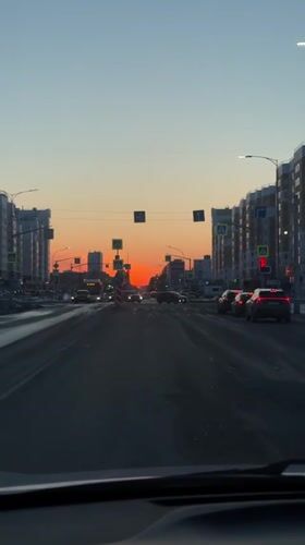 Dashcam captures sunset street view in Nizhnevartovsk, Russia