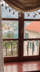 Morning scenes captured around Kotor harbor and markets