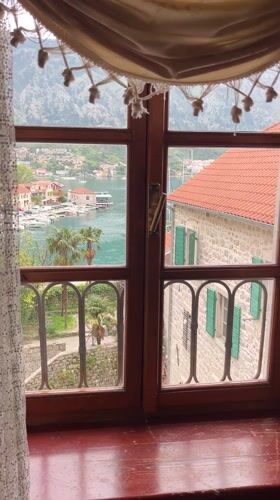 Morning scenes captured around Kotor harbor and markets