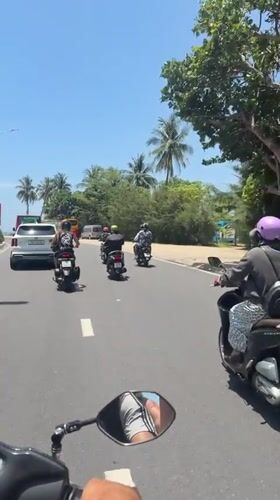 Morning scooter commute documented in Nha Trang, Vietnam