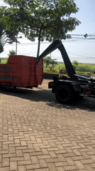 Morning traffic and waste operations across two East Java districts
