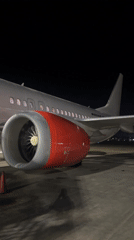 Aircraft spotted on nighttime tarmac in Kuta, Indonesia