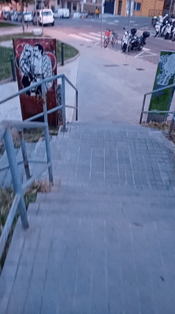 Metal sign with man and woman spotted on Barcelona stairs