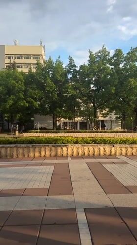 Afternoon plaza life documented near Bulgarian university campus