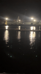Nighttime harbor scene documented in A Coruña, Spain