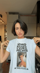 Woman poses in Moscow kitchen wearing Twin Peaks reference shirt
