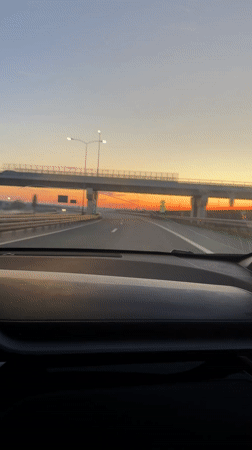 Car journey documented through Surčin, Serbia at sunset