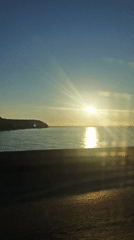 Sunrise captured on video over water near Noviy, Russia