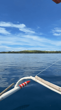 Boat journey documented near Dapa, Philippines coastline