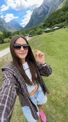 Tourist documents pastoral mountain scenery in rural Montenegro village