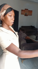 Woman takes selfies at home in Basawa Nigeria