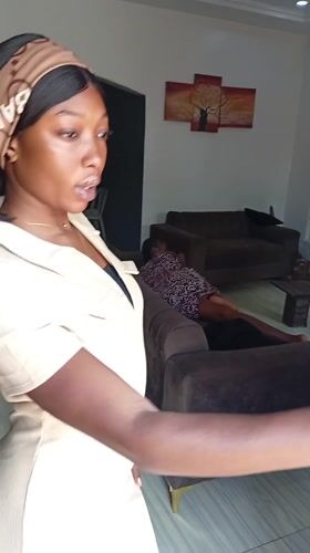 Woman takes selfies at home in Basawa Nigeria
