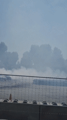 Silver sedan performs drift racing on Plovdiv track