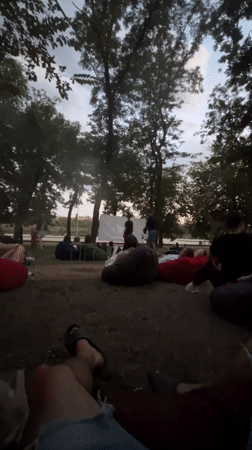 Outdoor cinema night and waterfront scenes in Kryvyi Rih