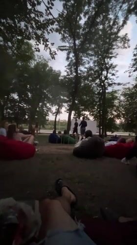 Outdoor cinema night and waterfront scenes in Kryvyi Rih