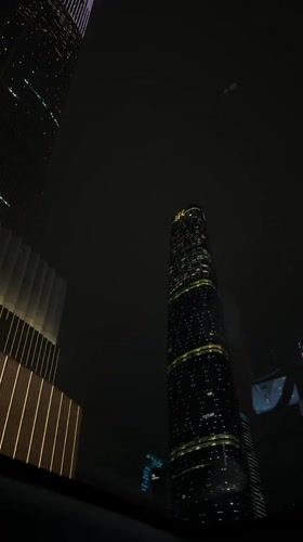 Nighttime city lights captured across Haizhu District skyscrapers