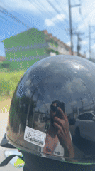 Motorcyclist Takes Helmet-Reflected Selfie on Chalong Road