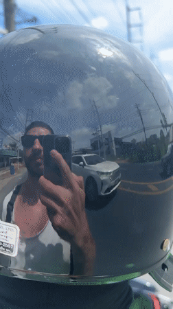 Motorcyclist Takes Helmet-Reflected Selfie on Chalong Road