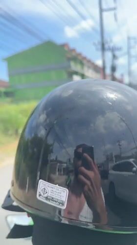 Motorcyclist Takes Helmet-Reflected Selfie on Chalong Road
