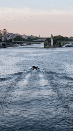 Seine riverfront and Eiffel Tower area at golden hour