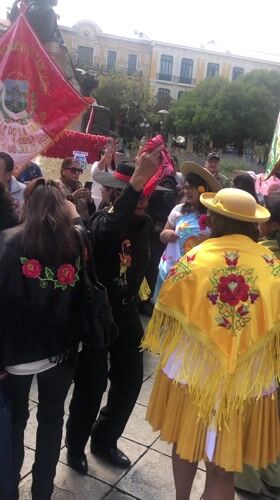 Traditional cultural celebration with dancing and music in La Paz