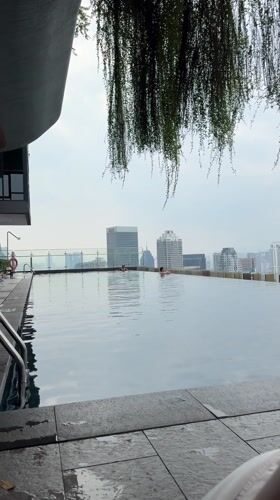 Morning rooftop pool leisure documented in Kuala Lumpur