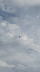 Aircraft observed over active construction site during afternoon hours