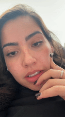 Woman records selfie videos while working on design project