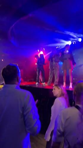 Late-night club scene in Yekaterinburg with live performances and DJ
