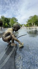 Children's bronze statues documented at Yerevan public fountain