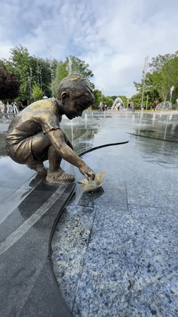 Children's bronze statues documented at Yerevan public fountain