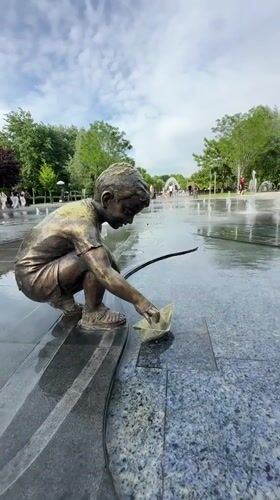 Children's bronze statues documented at Yerevan public fountain