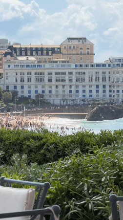 Sunny midday leisure scenes captured at Biarritz beaches and terraces