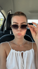 Woman documents car wash visit with selfies in Audi