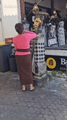 Early morning street life captured in Denpasar, Indonesia