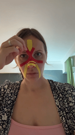 Woman prepares late-night drink in Fethiye kitchen