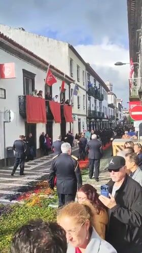 Firefighters and marching band parade through Ponta Delgada streets