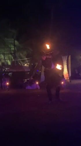 Fire dancer performs torch routine at Thailand venue