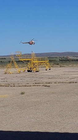 Ground ops and a stray bird at Oskemen Airport