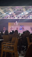 Red and white performers light up a Marmaris outdoor stage