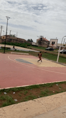 Basketball game played on outdoor court in Gura Top